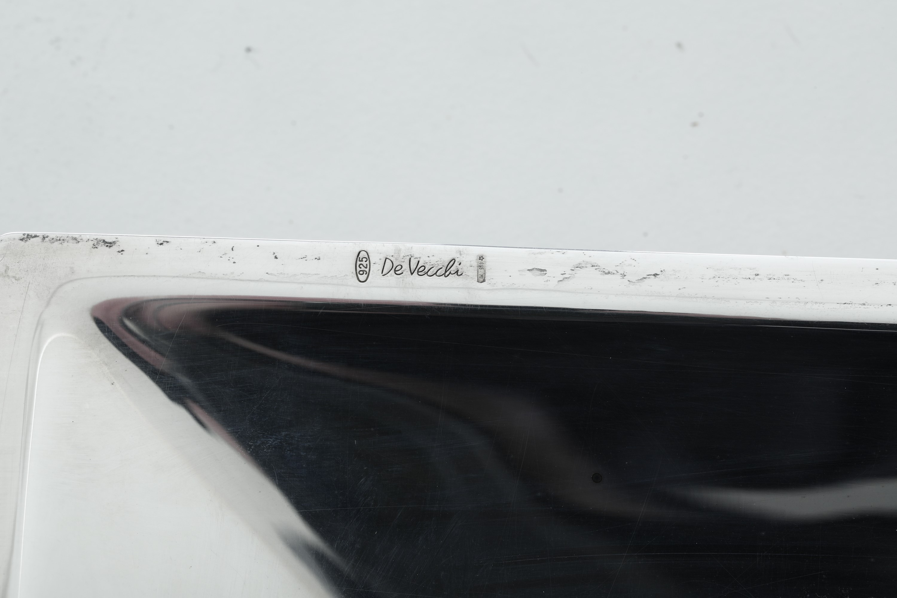 Design De Vecchi, Svuotatasche in argento fuso e sagomato