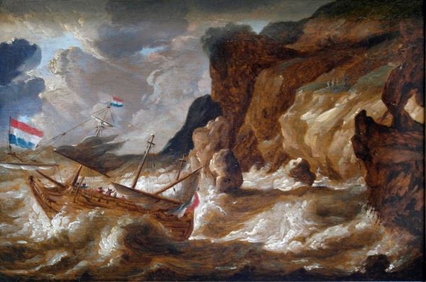 eliero in balia delle onde nei pressi della scogliera