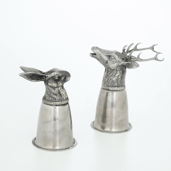 Coppia di bicchieri da vino in metallo Gucci. XX secolo