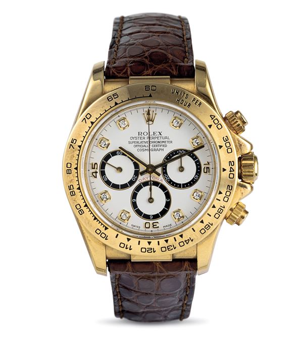 Rolex - Daytona ref 16518, 18k yellow gold, white dial diamond markers, never polished, accompanied by original guarantee