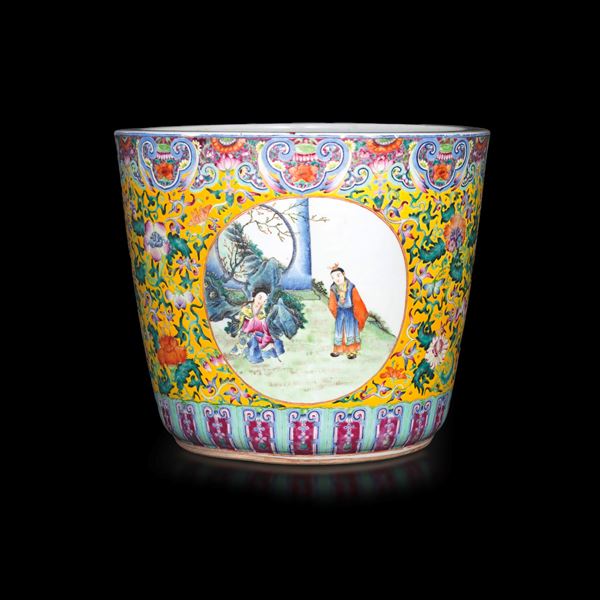 Large porcelain Famille Rose polychrome garden bowl with scene depicting communal life within reserves and floral decorations, China, Republic period, 20th century