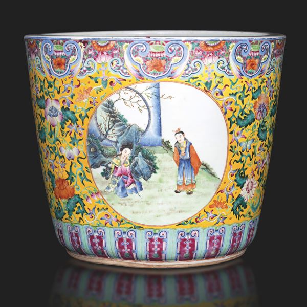 Large porcelain Famille Rose polychrome garden bowl with scene depicting communal life within reserves and floral decorations, China, Republic period, 20th century