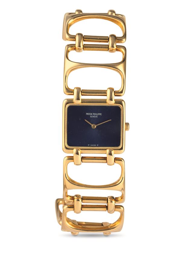 Ref 4237-1 with 18k yellow gold chain bracelet, blue dial manual winding