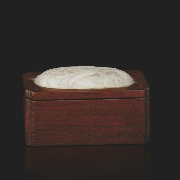 Homu wooden box with white jade plaque with naturalistic decoration, China, Qing Dynasty, 19th century