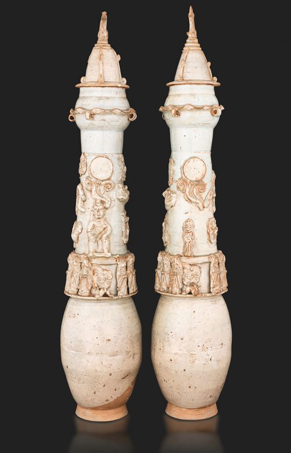 Pair of large porcelain funerary urns with Qingbai lids with relief figures, China, Song Dynasty (960-1279)