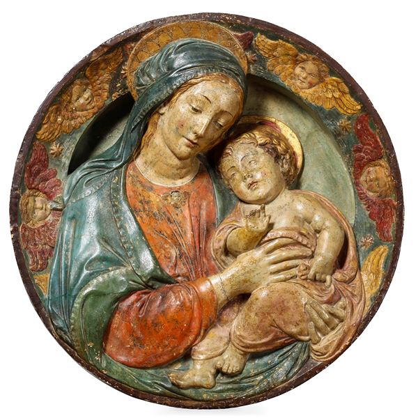 Firenze, seconda metà del XV secolo Importante rilievo raffigurante Madonna con Bambino e cherubini