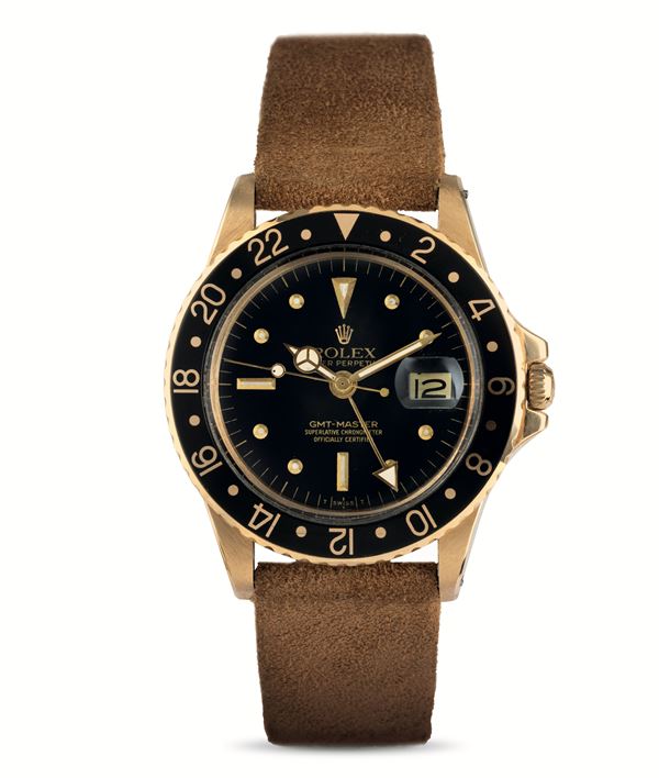 Rolex - GMT Master ref 1675/8 in oro giallo 18k, quadrante nero Nipple e cinturino in pelle