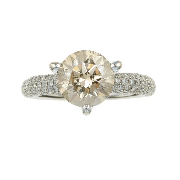 Natural fancy brown diamond weighing 4.13 carats and gold ring