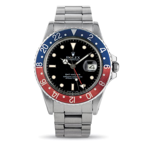 Rolex - GMT Master Pepsi ref 16750, transitional model plastic glass tumbler dial with bidirectional bezel, Oyster bracelet accompanied by box and guarantee