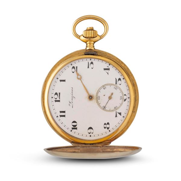 Savonette in oro giallo 18k, quadrante smalto bianco con piccoli secondi al sei, movimento con scappamento ad ancora<BR>48,5 mm, peso 72 g<BR>