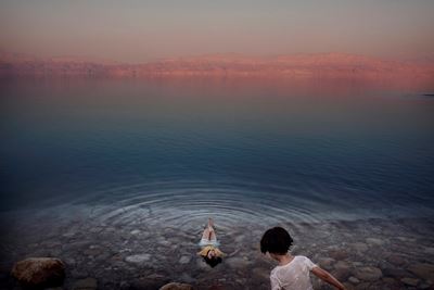 Palestinian Girls Floating in The Waters Of The Dead Sea