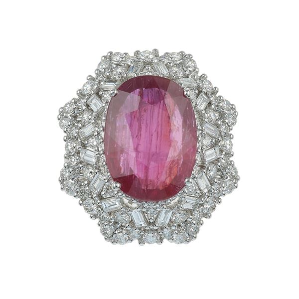 Ruby, diamond and gold ring. The ruby is with indications of heating, with a residue in healed fissures