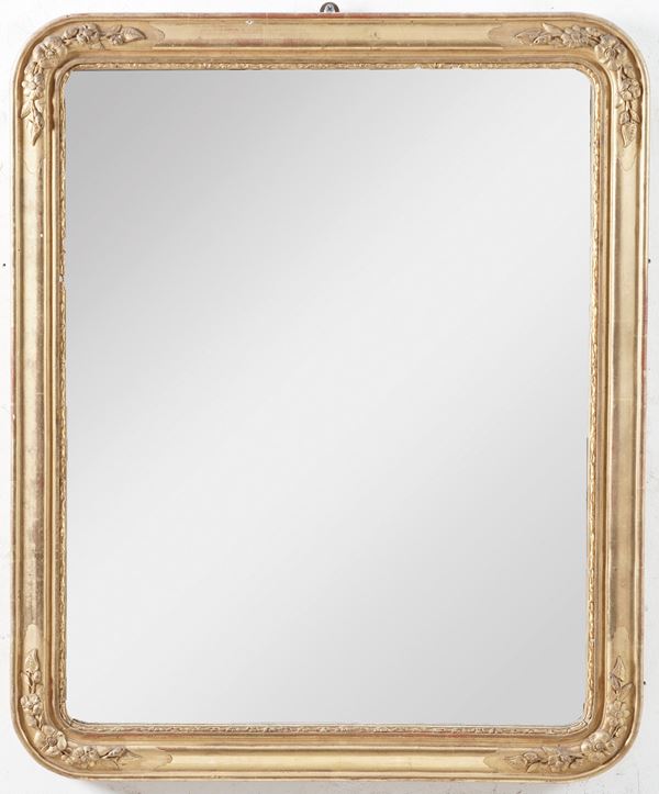 Specchiera in legno dorato. XX secolo