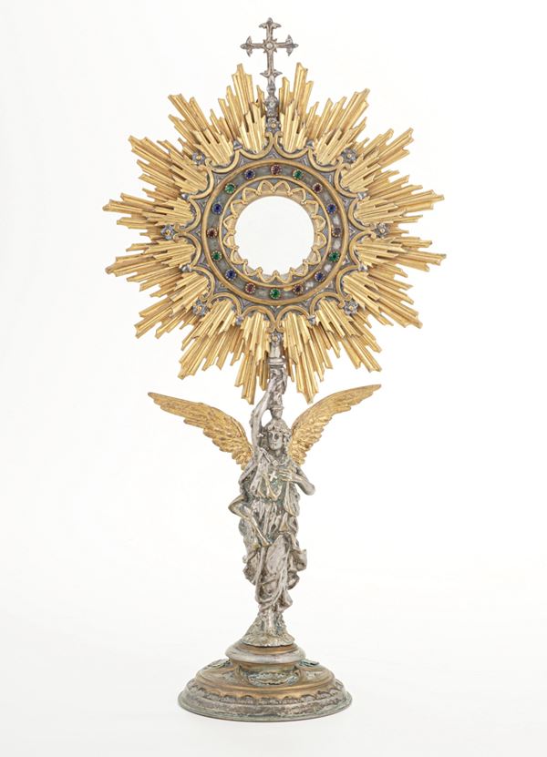 Grande reliquiario in metallo argentato e dorato. XIX- XX secolo