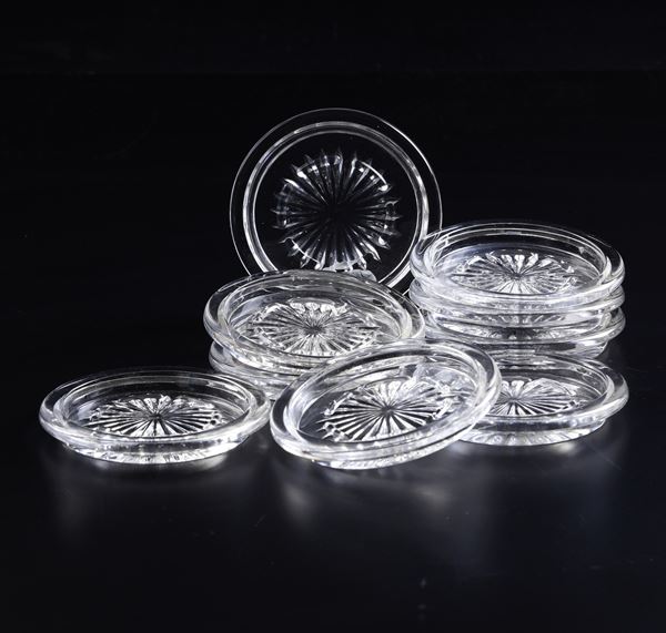 Dodici sottobicchieri. Francia, Manifattura Baccarat, secondo quarto del XX secolo. 