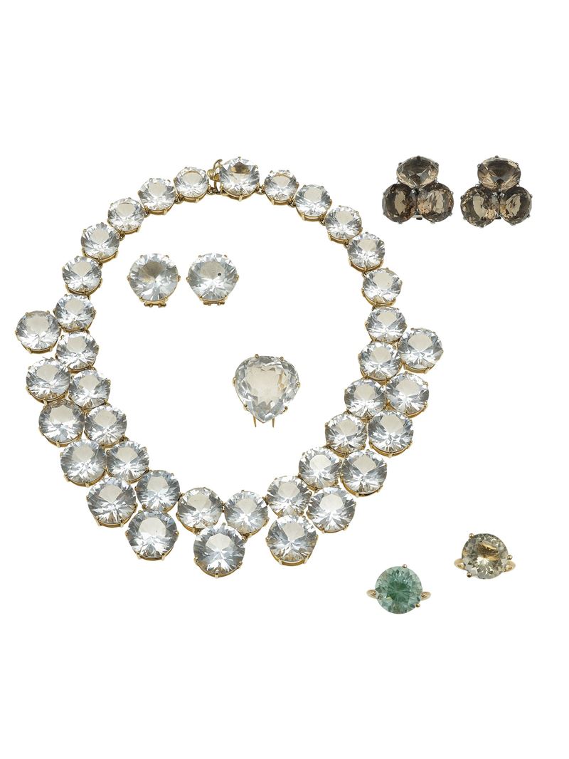 Lotto composto da collana, due paia di orecchini, due anelli ed una spilla con quarzi e topazi  - Asta Fine Jewels - Cambi Casa d'Aste