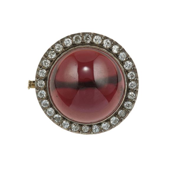 Garnet, diamond, silver and gold brooch
