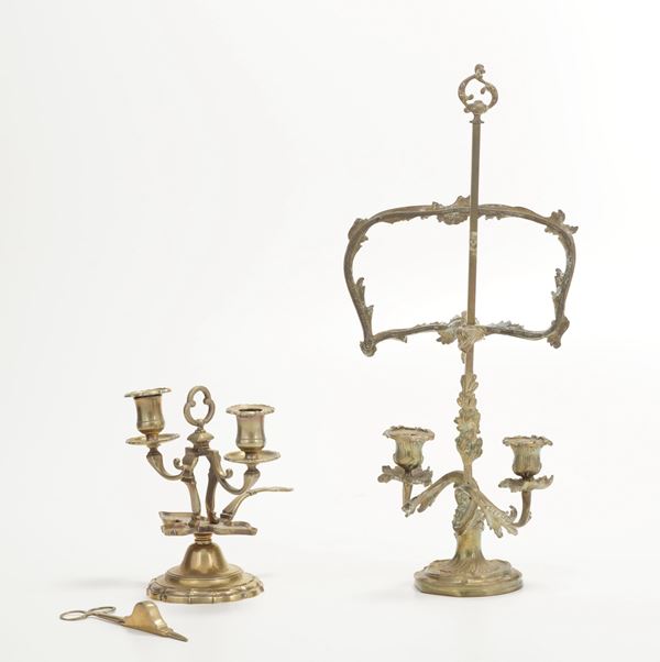 Lotto di due candelieri diversi, XIX secolo