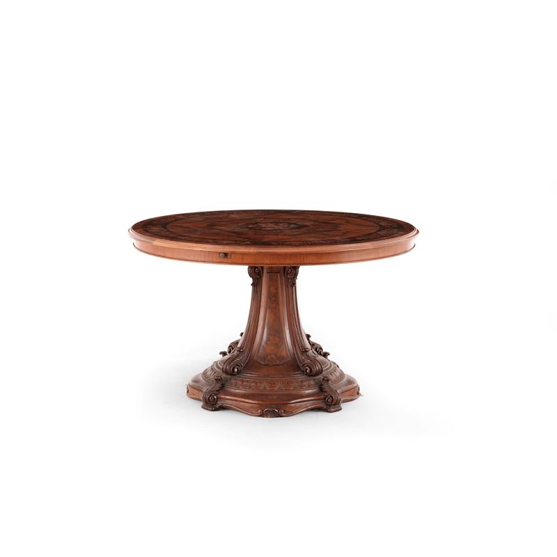 Tavolo circolare in lagno intagliato, lastronato ed intarsiato. XIX secolo  - Asta Antiquariato - Cambi Casa d'Aste