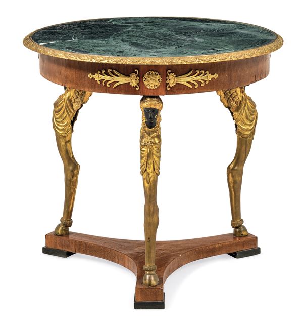 Tavolo Impero lastronato, intagliato e dorato. XIX secolo
