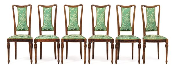 Sei sedie Liberty in legno intagliato. XX secolo