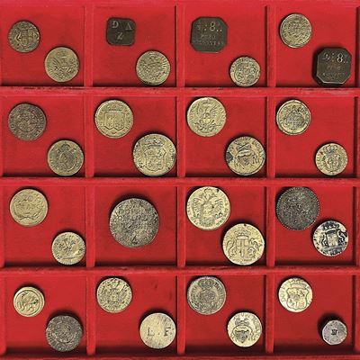 Varie. Lotto di 31 Pesi Monetali.