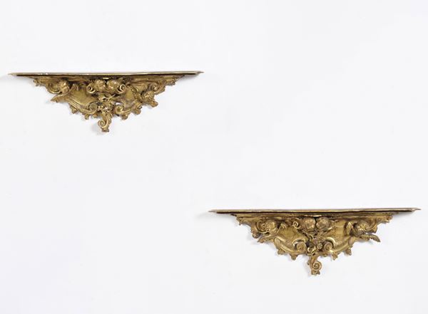 Coppia di fregi in legno scolpito e dorato. XVII-XVIII secolo