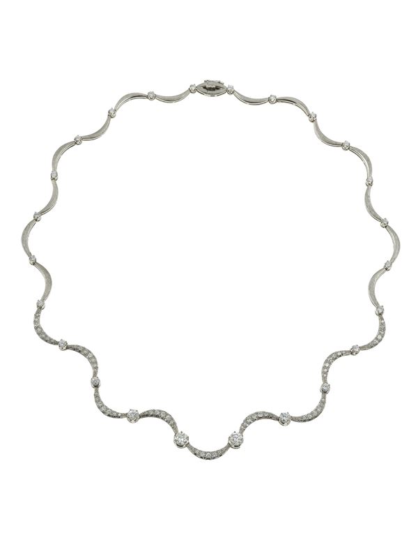 Diamond and gold necklace. Signed Maino