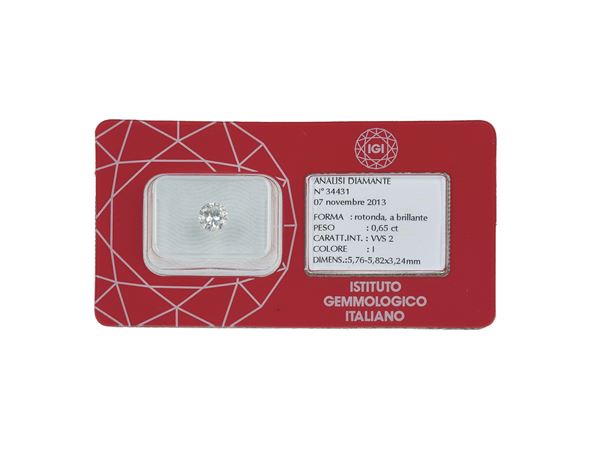 Brilliant-cut diamond weighing 0.65 carats, color I, clarity VVS2, fluorescence weak. Gemmological Report IGI Milano n. 34431