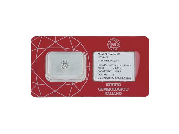 Brilliant-cut diamond weighing 0.72 carats, color I, clarity VVS2, fluorescence weak. Gemmological Report IGI Milano n. 34427