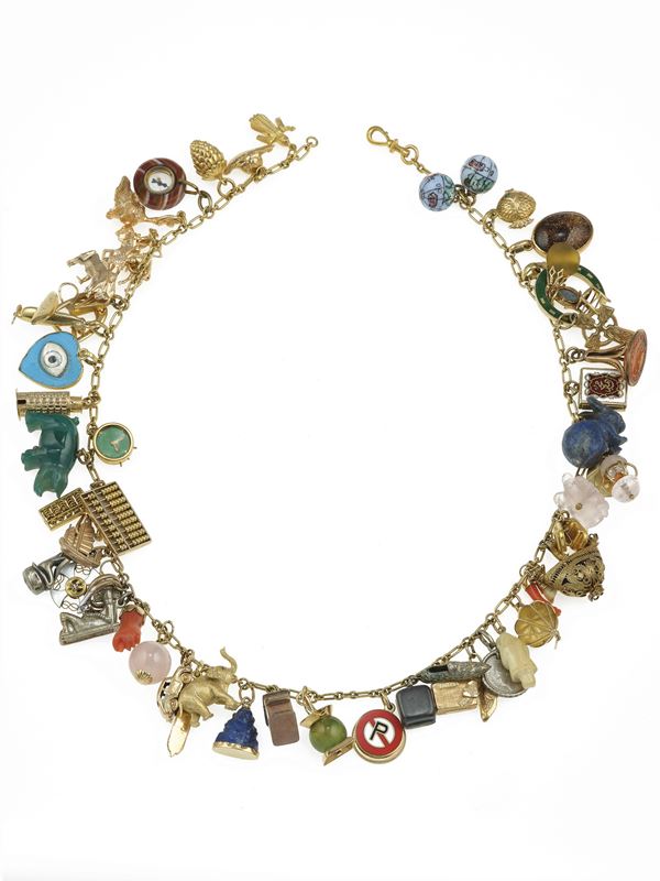 Gold, low-karat gold and silver charms necklace