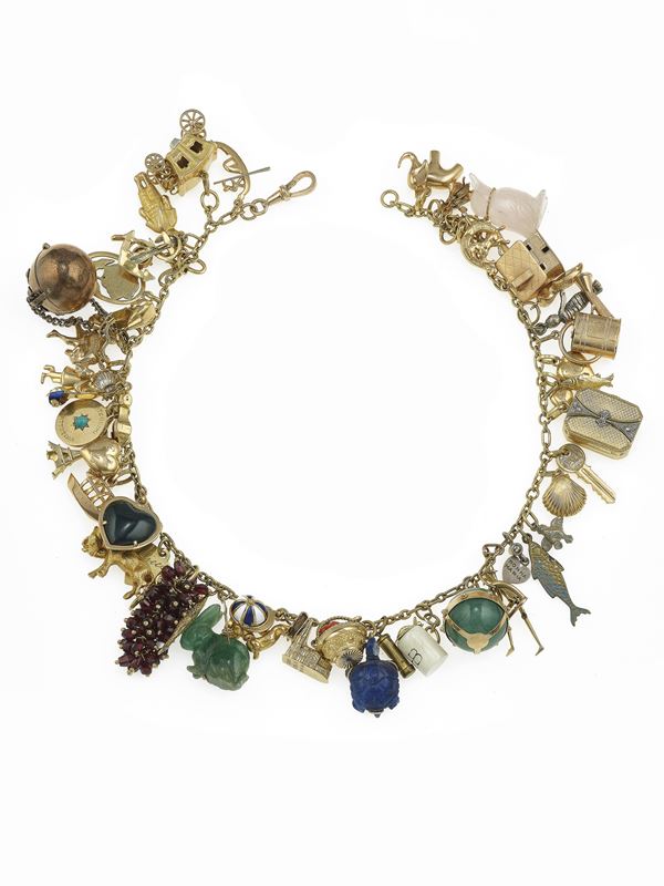 Gold, low-karat gold and silver charms necklace