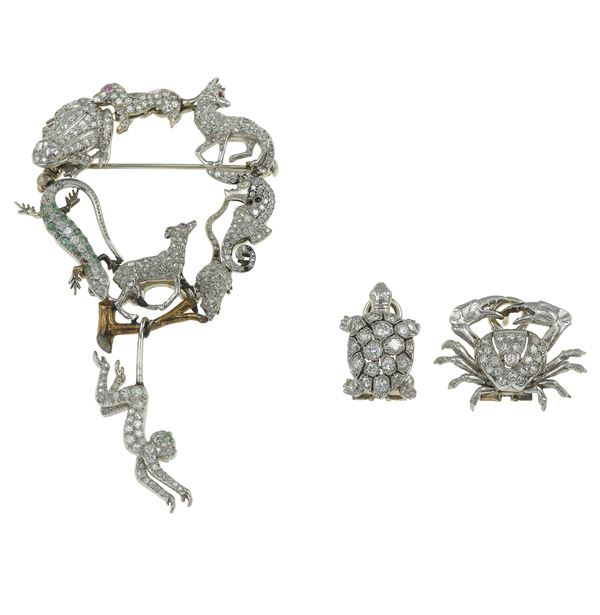 Diamond, emerald and ruby demi-parure. Some missing diamonds