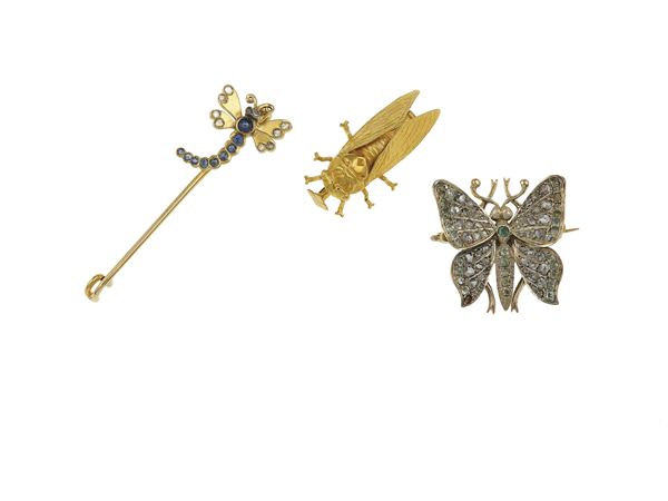 Three gold and silver brooches