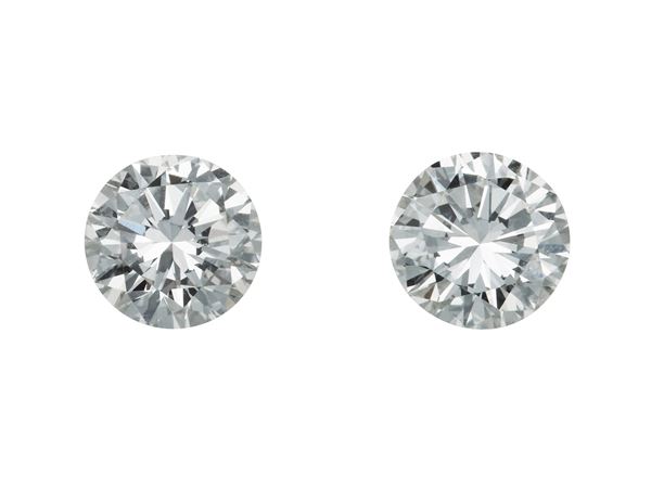 Pair of two brilliant-cut diamonds weighings 1.08, color I and J, clarity VVS2, fluorescence none. Gemmological Report R.A.G. Torino n. D24036mn
