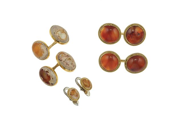 Pair of mexican opal and gold cufflinks and studs and a pair of cufflinks