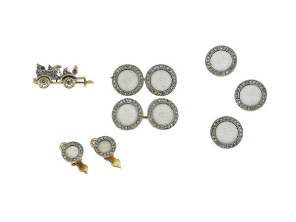 Diamond, gold and platinum men's accessories and a little brooch