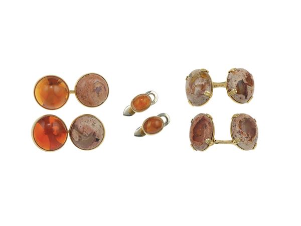 Two pairs of gold and mexican opal cufflinks and studs