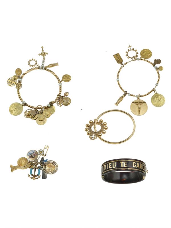 Four gold bracelets and charms brooch