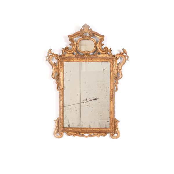 Cornice in legno intagliato e dorato. XIX-XX secolo