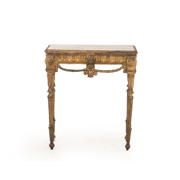 Consolle Luigi XVI in legno intagliato e dorato. XVIII-XIX secolo