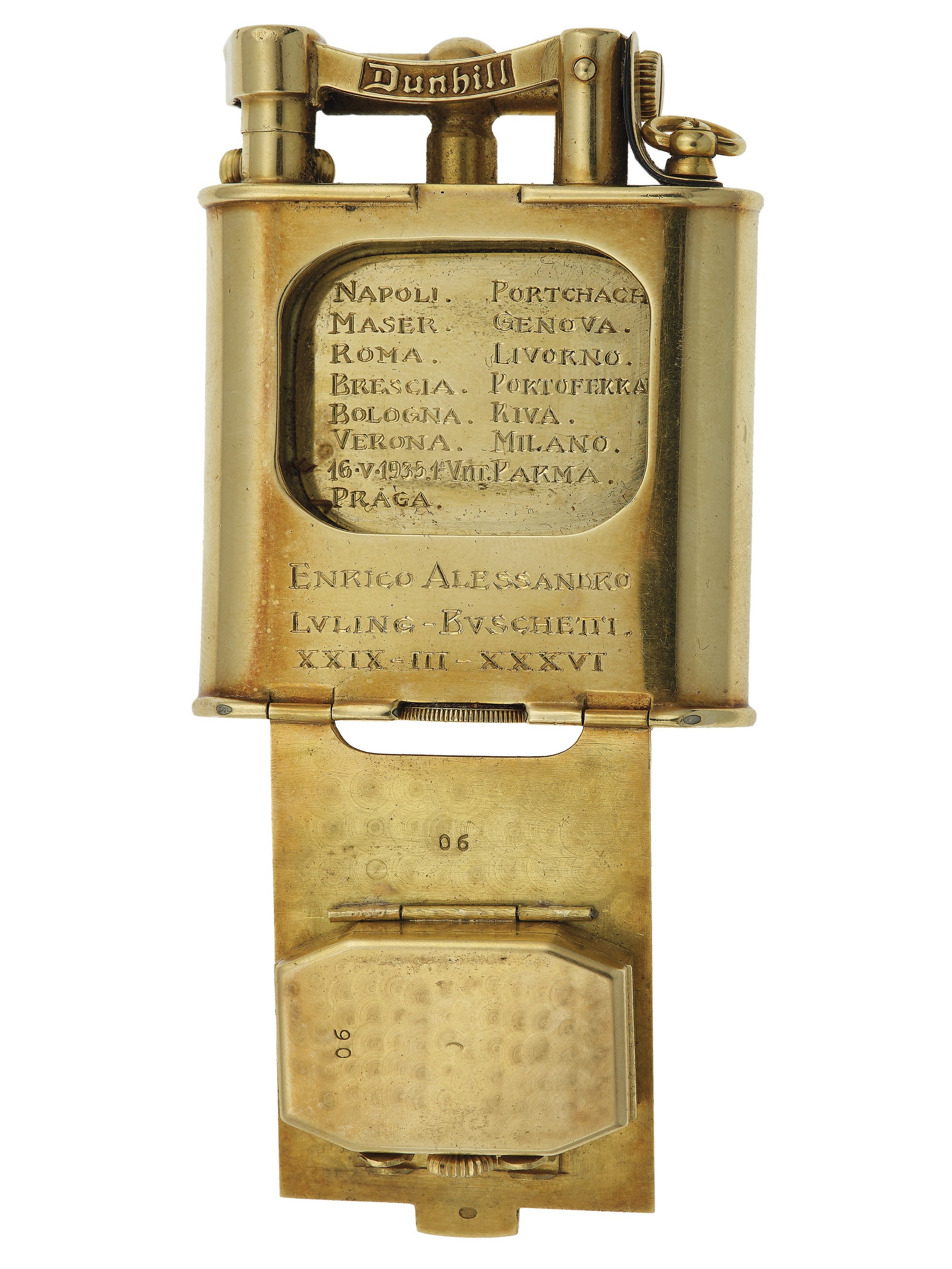 Lotto di fermasoldi in oro 750/1000 e accendini Dunhill, uno con orologio e dedica