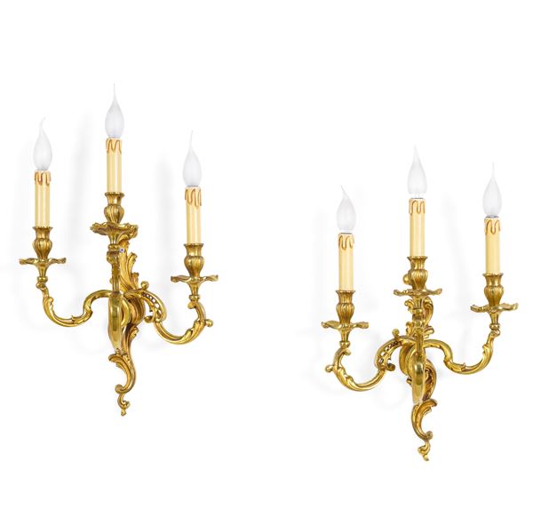 Coppia di appliques in bronzo dorato. XIX-XX secolo