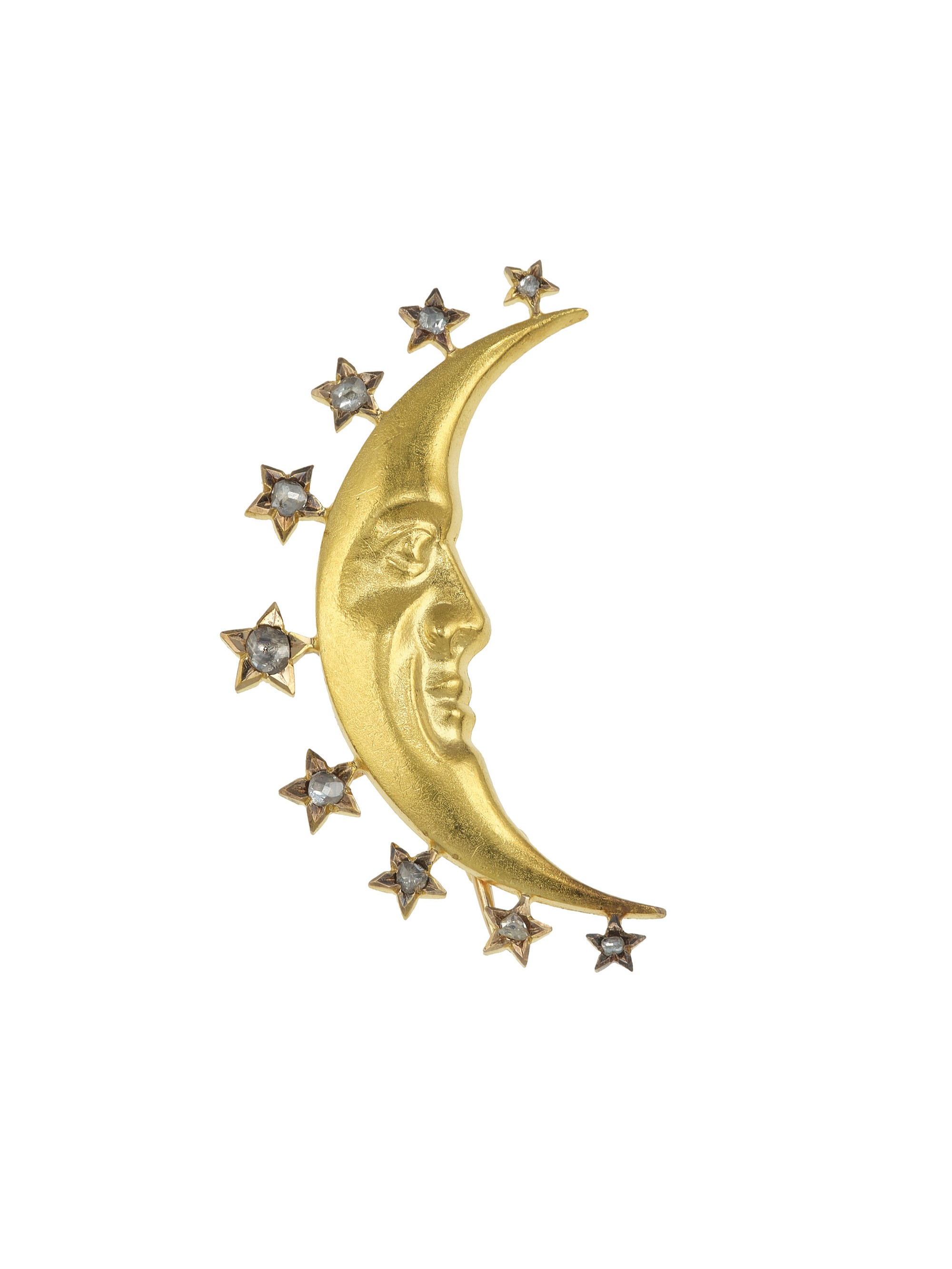Lotto di gioielli in oro 750/1000, due bracciali con charms e spilla a mezza luna