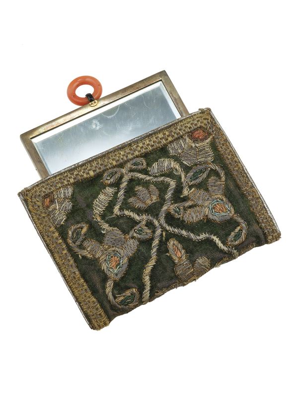 Silver and sterling lady's accessories. Hand mirror signed Bulgari