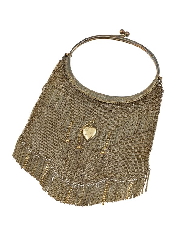 Two silver and metal evening bags and two silver and metal coin holder