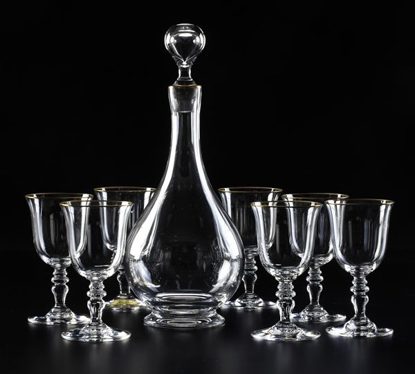 Diciotto calici e una bottiglia "Annie". Francia, Manifattura Baccarat, XX secolo. 