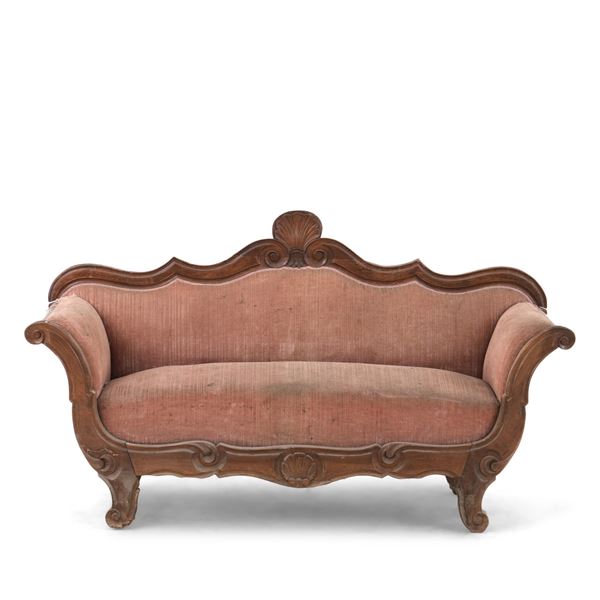 Divano a barca in legno intagliato. XIX secolo