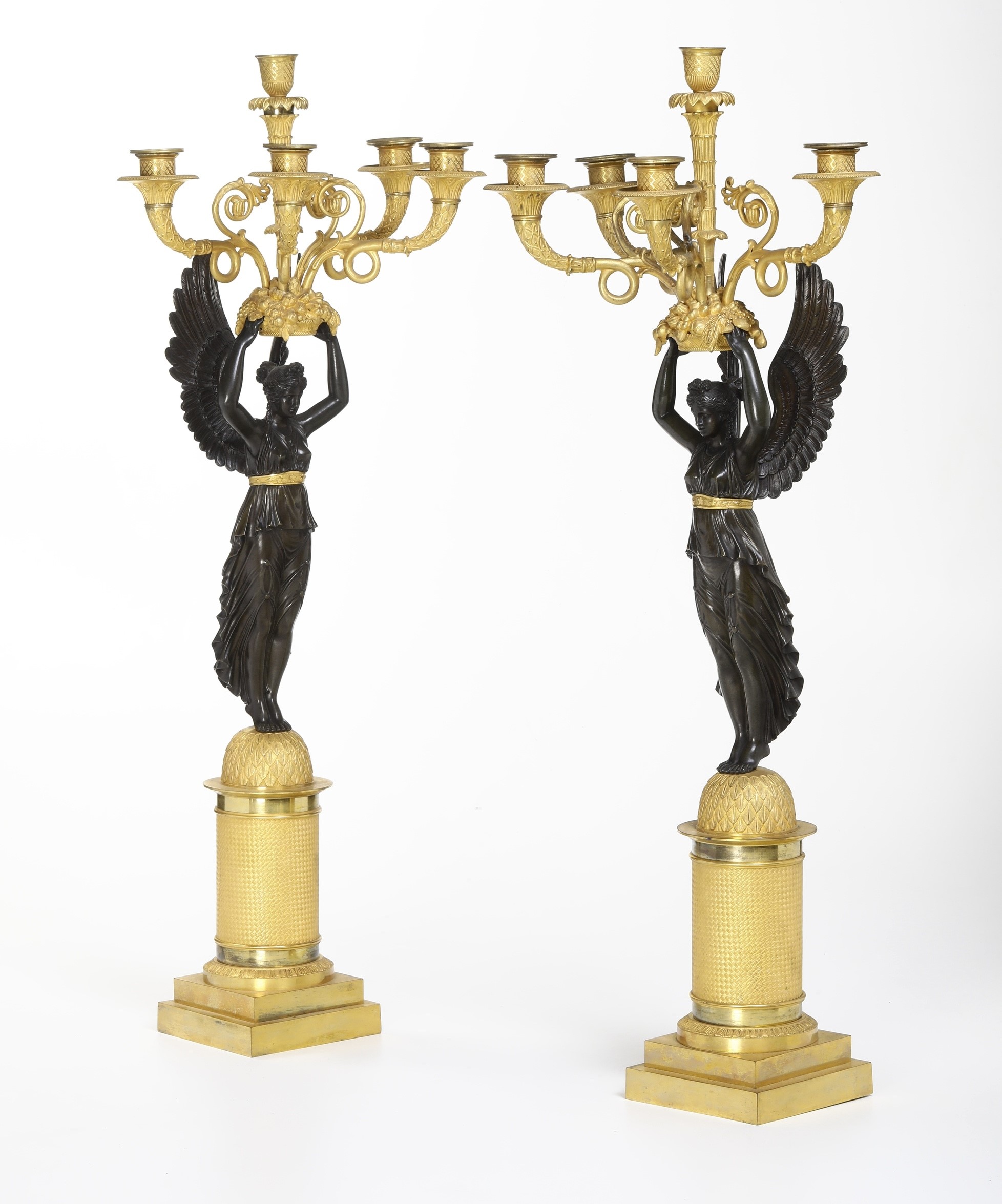 Coppia di Candelabri in Bronzo Dorato e Patinato. XIX Secolo
