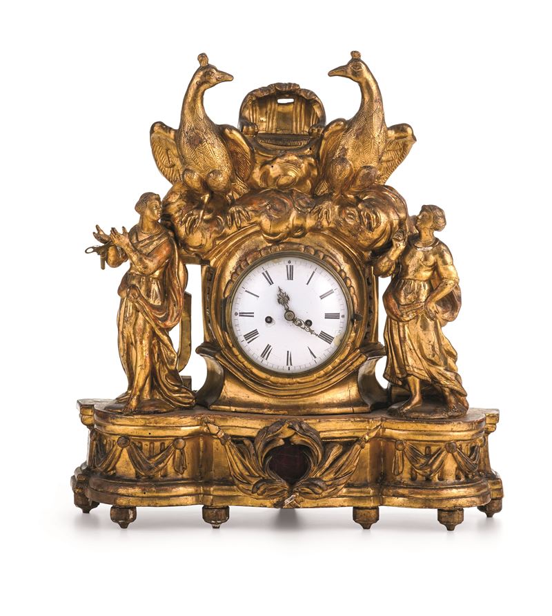 Pendola da tavolo in legno scolpito e dorato. XIX secolo  - Asta Sei Secoli di Arti e Arredi - III - Cambi Casa d'Aste